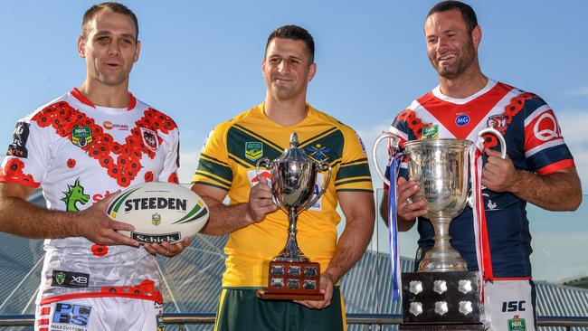 Jason Nightingale and Boyd Cordner with Corporal Mitch Knowles. (AAP/Peter Rae)