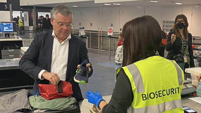 Senator Murray Watt is tested by Australian biosecurity staff while entering Sydney International Airport following a trip to Indonesia on July 15. Picture: Twitter