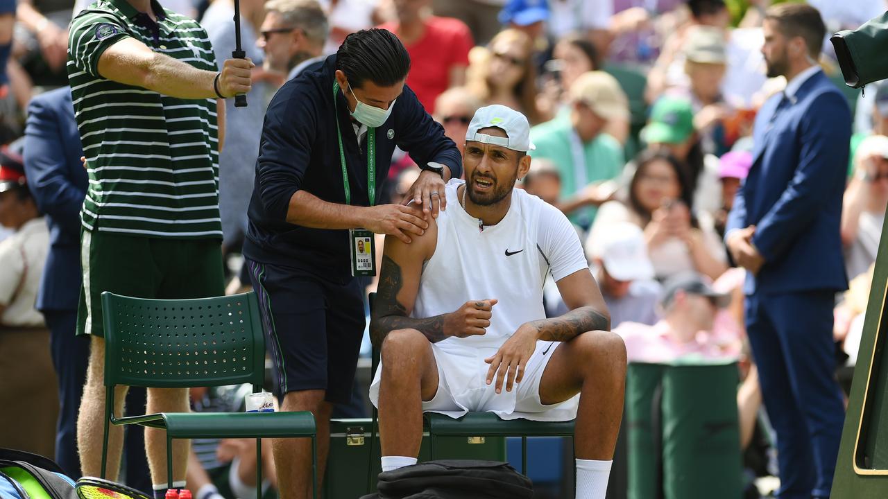 Nick Kyrgios receives medical treatment during the third set. (Photo by Shaun Botterill/Getty Images)