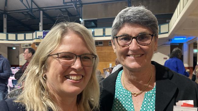 Lynn Watt and Karen Pearce celebrate the 50th anniversary of the Rainbows Rugby League Football Club at its golden jubilee at the Gympie Showgrounds Pavilion on the night of June 3, 2023.