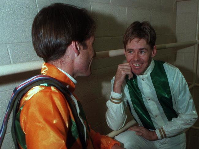 Brent Thomson, talking with Damien Oliver in 1997, has offered to mentor young Queensland jockeys.