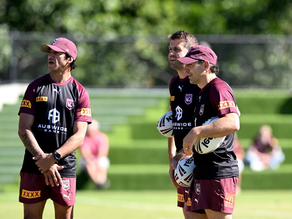 Billy Slater with Maroons assistant coaches Josh Hannay and Johnathan Thurston.