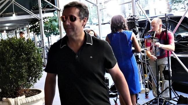 Donald Trump's former fixer, Michael Cohen, returns to his Trump Tower flat in New York yesterday. Picture: MEGA