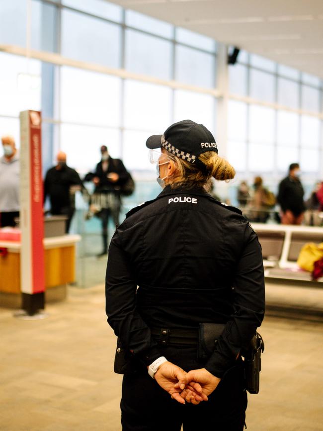 A police officer guards at Adelaide Airport during the Covid-19 ‘emergency’. Picture: Morgan Sette