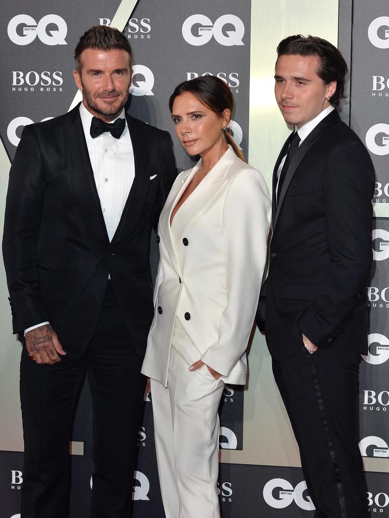 Brooklyn, pictured with David and Victoria at the 2019 GQ Men of the Year awards, has reportedly been left on the outside after a rift has driven the family apart. David and Victoria are reportedly “utterly heartbroken” by the relationship breakdown and the Evening Standard reported that Brooklyn hadn’t even contacted his father about his birthday. Photo by Jeff Spicer/Getty Images