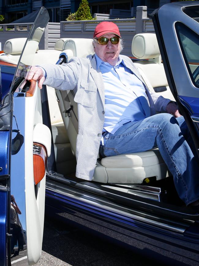 John Laws in his convertible Rolls Royce.