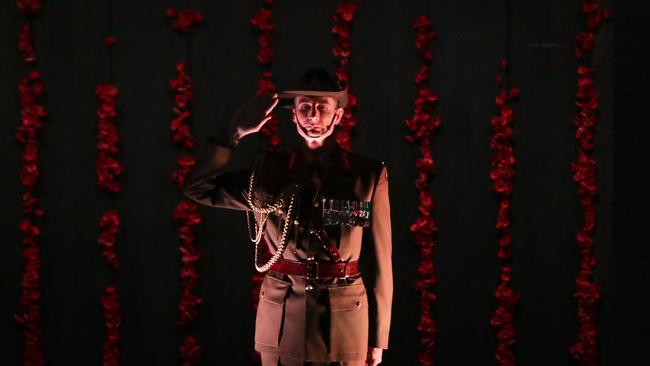 Chief of the Defence Force General Angus Campbell stands along the Roll of Honour during the Anzac Day commemorative service at the Australian War Memorial in Canberra on Saturday.