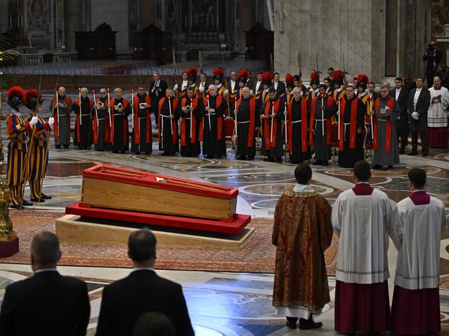 VATICAN CITY, VATICAN - APRIL 23: The body of Pope Francis lies in state at the Basilica St Peter on April 23, 2025 in Vatican City, Vatican. On the third day since the death of Pope Francis was announced by the Vatican, his body is transferred from the Chapel of Santa Marta to the Basilica St Peter. He will lie in state in a simple wooden coffin until his funeral, which will be held on Saturday, 26th April 2025. (Photo by Antonio Masiello/Getty Images)