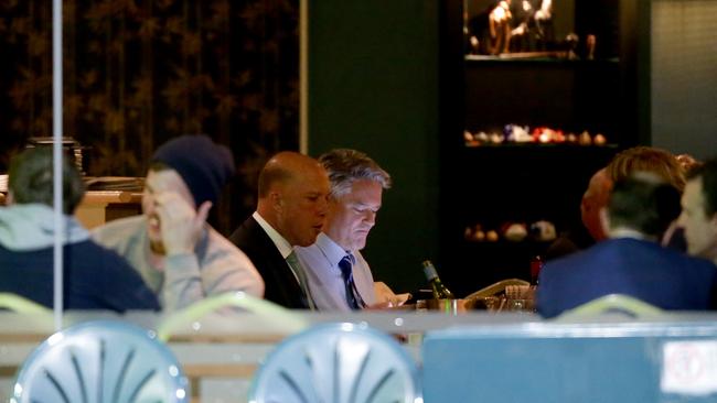 Peter Dutton and Mathias Cormann having dinner at Portia's Place restaurant in Kingston last night. Picture: Jonathan Ng