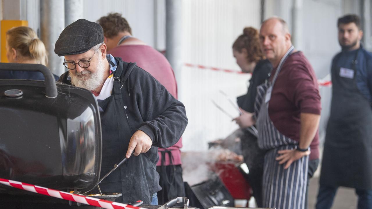 David Taylor and the team from Aurora Training Institute cook up a feast for the Gunfire breakfast at The Goods Shed on ANZAC DAY. Tuesday, April 25, 2023. Picture: Nev Madsen.