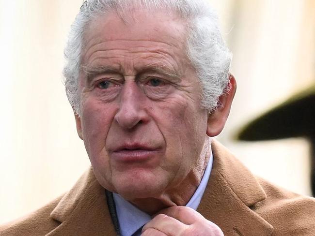 Britain's King Charles III reacts as he leaves at the end of the Royal Family's traditional Christmas Day service at St Mary Magdalene Church in Sandringham, Norfolk, eastern England, on December 25, 2022. (Photo by Daniel LEAL / AFP)