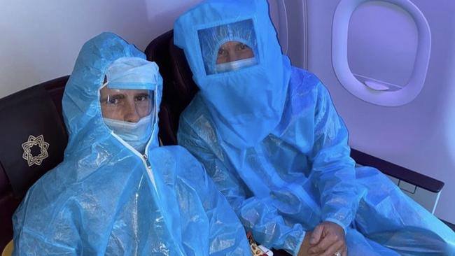 IPL cricketers, New Zealand's Kane Williamson and Australia's David Warner decked out in a hazmat suit on board a domestic flight in India. Picture: Instagram.