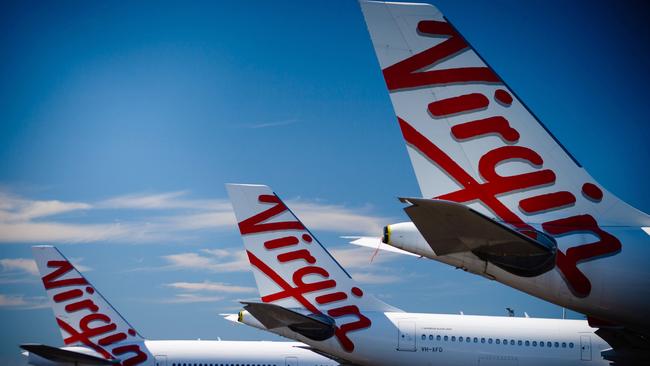 The extension of federal government aid will help keep Virgin Australia flying till it completes a sale. Picture: AFP