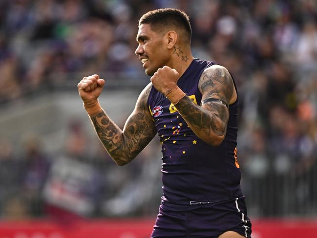 PERTH, AUSTRALIA - JULY 21: Michael Walters of the Dockers celebrates a goal during the 2024 AFL Round 19 match between the Fremantle Dockers and the Melbourne Demons at Optus Stadium on July 21, 2024 in Perth, Australia. (Photo by Daniel Carson/AFL Photos via Getty Images)