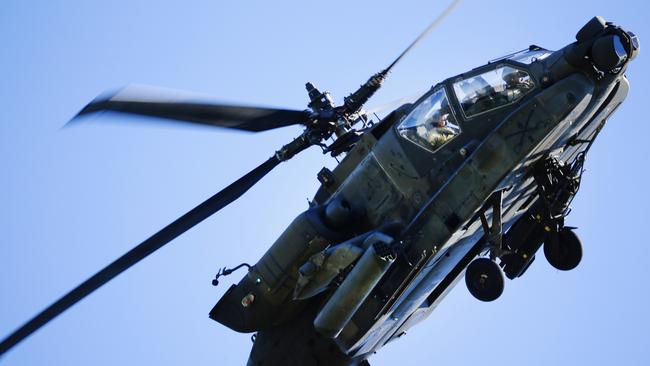 An American Apache Attack Helicopter supplies air support during battle exercises at Shoalwater Bay.