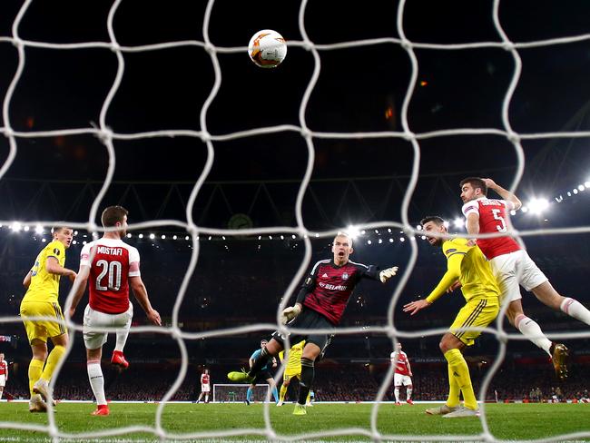 LONDON, ENGLAND - FEBRUARY 21: Sokratis Papastathopoulos of Arsenal scores his team's third goal during the UEFA Europa League Round of 32 Second Leg match between Arsenal and BATE Borisov at Emirates Stadium on February 21, 2019 in London, United Kingdom. (Photo by Clive Rose/Getty Images) *** BESTPIX ***