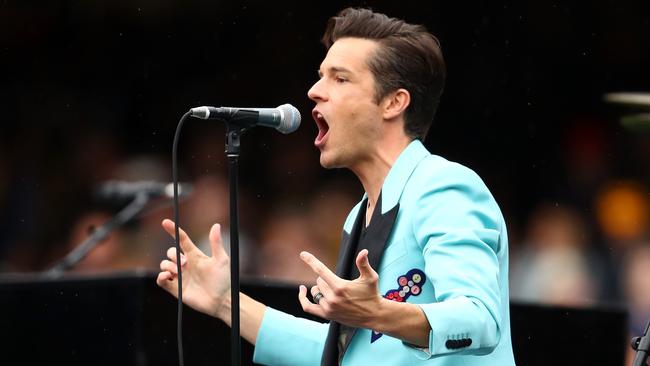 Brandon Flowers and The Killers perform during the 2017 AFL Grand Final pre-game entertainment. (Photo by Cameron Spencer/AFL Media/Getty Images)