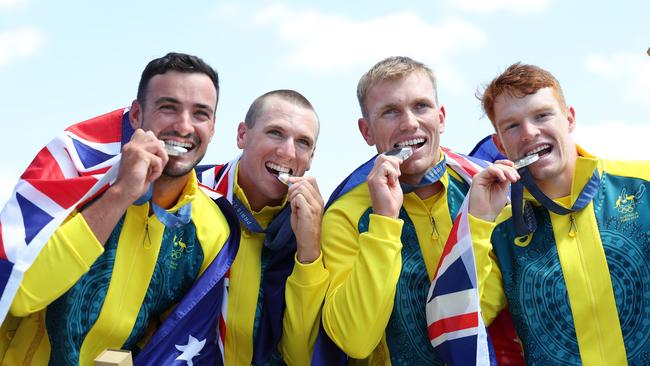 PARIS, FRANCE - AUGUST 08: Silver medalists Riley Fitzsimmons, Pierre van der Westhuyzen, Jackson Collins and Noah Havard of Team Australia pose after the Canoe Sprint medal ceremony after the Men's Kayak Four 500m Finals on Day thirteen of the Olympic Games Paris 2024 at Vaires-Sur-Marne Nautical Stadium on August 08, 2024 in Paris, France. (Photo by Justin Setterfield/Getty Images)