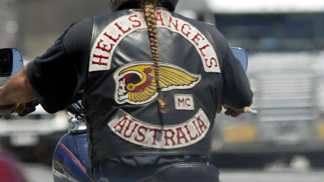 The Hells Angels members were charged after a meeting in a graveyard.