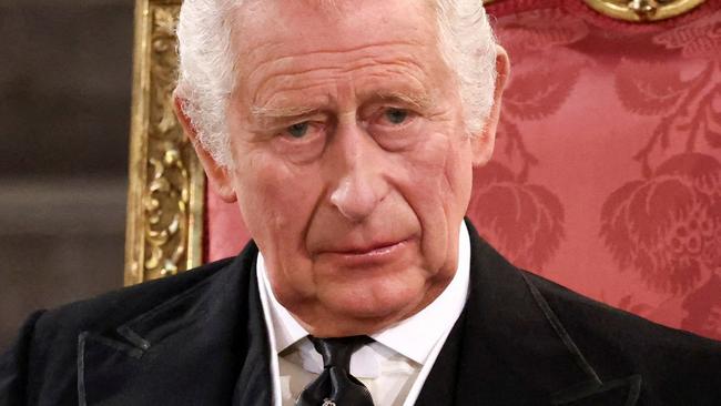 TOPSHOT - Britain's King Charles III attends the presentation of Addresses by both Houses of Parliament in Westminster Hall, inside the Palace of Westminster, central London on September 12, 2022, following the death of Queen Elizabeth II on September 8. (Photo by HENRY NICHOLLS / POOL / AFP)