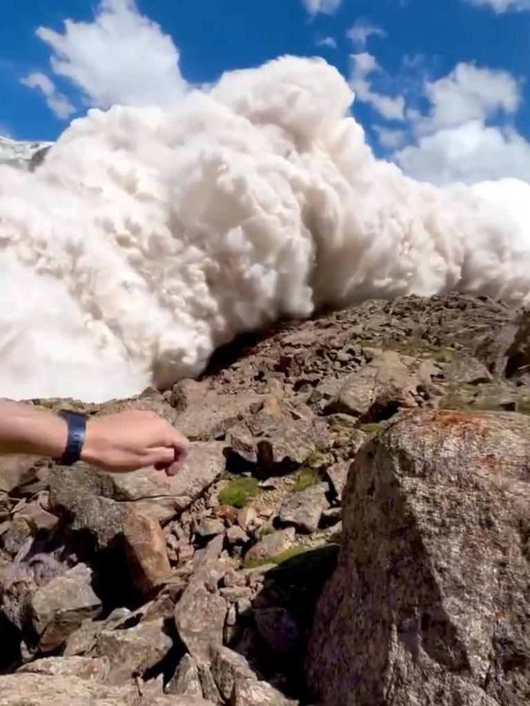 The avalanche swept over the group, leaving just two with injuries. Picture: Harry Shimmin/Viralhog