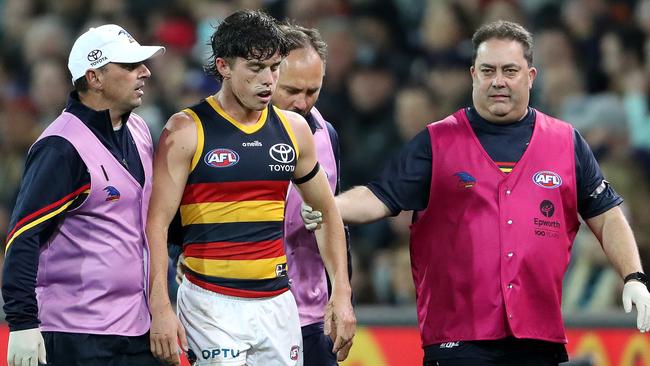 Ned McHenry was subbed out of the game in the first quarter. Picture: Sarah Reed/AFL Photos/Getty Images