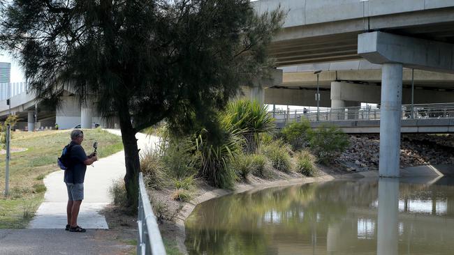 Breakfast Creek/Enogger Creek at Windsor rarely reaches this height. Northey Street, Windsor, today.  (AAP Image/Jono Searle)