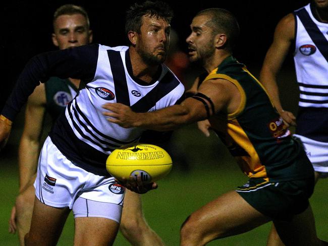 Todd Hughes featured in Bundoora’s 2017 Division 1 flag. Picture: Hamish Blair