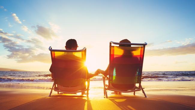 ESCAPE: Romance, Paul Ewart -  Retirement Vacation Concept, Happy Mature Retired Couple Enjoying Beautiful Sunset at the Beach . Picture: iStock