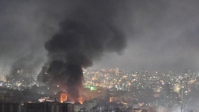 Smoke rises from the site of an Israeli air strike that targeted a neighbourhood in the southern suburb of Beirut. Picture: Fadel Itani/AFP