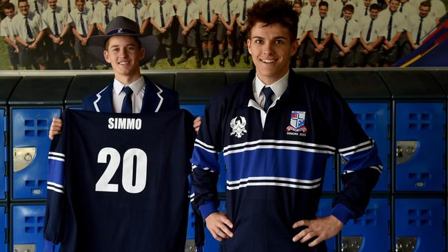 Ignatius Park College year 12 students Kai Simmons and Harry Keir, both 17, with their levers jerseys. Picture: Evan Morgan