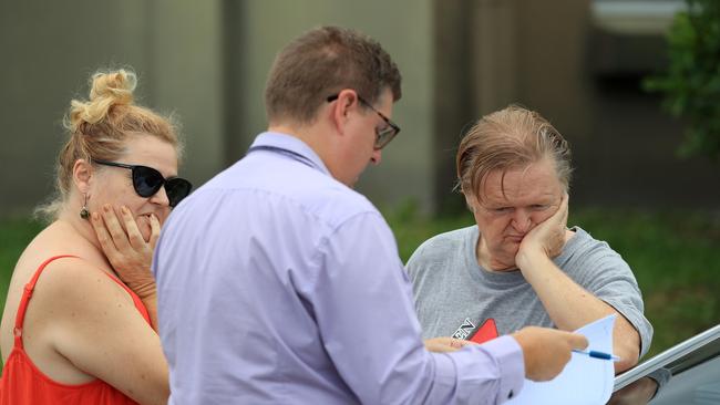 Shocked neighbours speak to police. Picture: Adam Head.