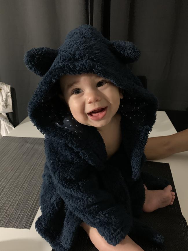 Davontae Williams at nine months all snuggled up in his robe with big smiles. Picture: Destiny