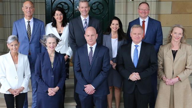 Members of the Tasmanian ministry pose for a photograph after being sworn in by Governor Kate Warner (front row, second from left) at Government House on Wednesday, May 19, 2021.