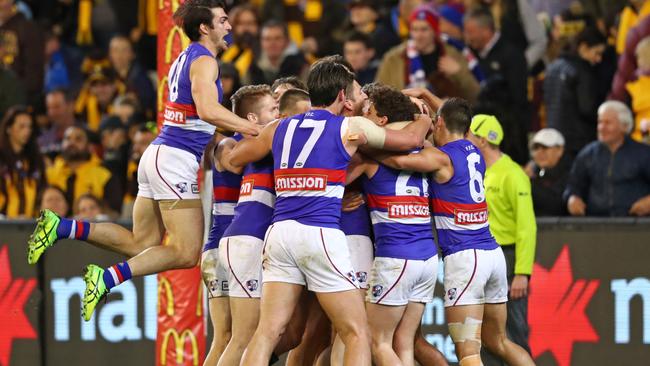 The Bulldogs celebrate after the final siren. Picture: Scott Barbour/AFL Media/Getty Image