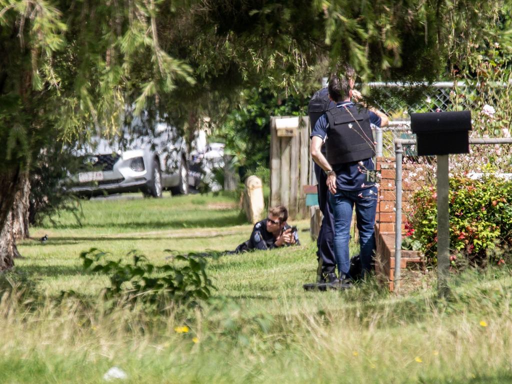 Police at the scene of a siege with an armed man in Doonkuna St, Kingaroy. March 21, 2022. Picture: Dominic Elsome