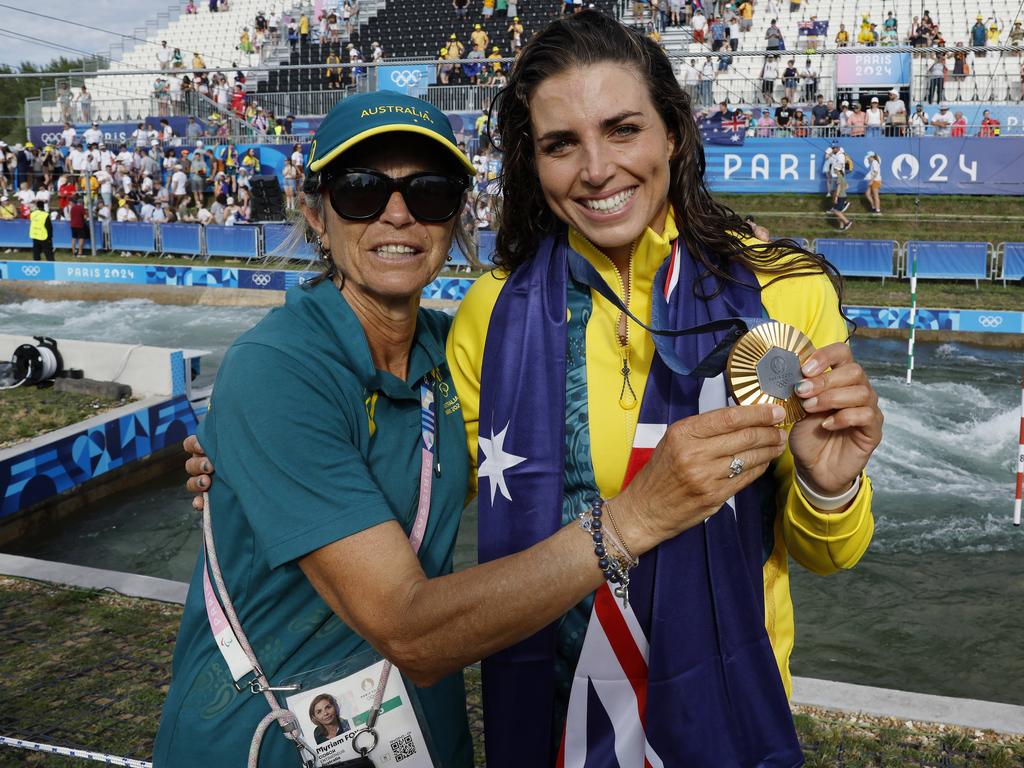 Australias Jess Fox and her mum Miriam with her gold medal. Picture: Michael Klein