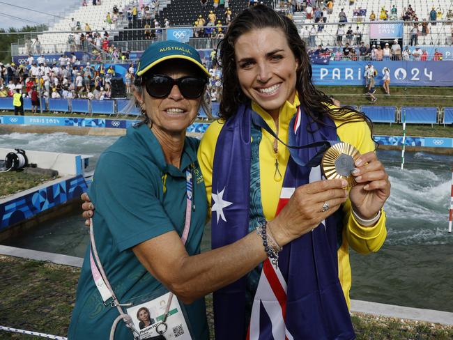 Australias Jess Fox and her mum Miriam with her gold medal. Picture: Michael Klein