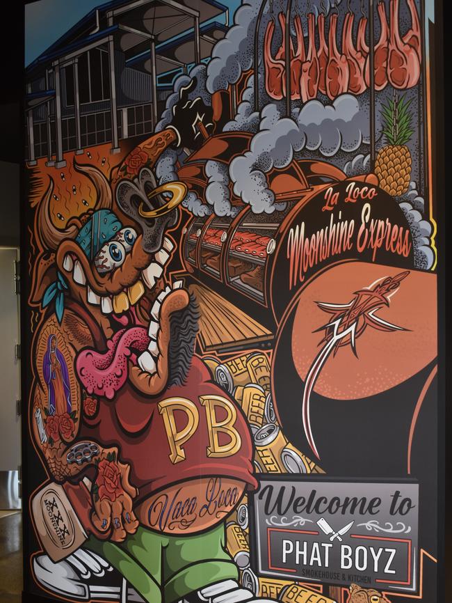 Mural by graffiti artist and tattooist Micky Hora inside Phat Boyz Smokehouse and Kitchen.