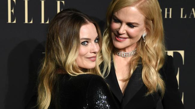 TOPSHOT - Australian actresses Nicole Kidman (R) and Margot Robbie arrive for the 26th annual ELLE Women in Hollywood Celebration in Beverly Hills, California, on October 14, 2019. (Photo by VALERIE MACON / AFP)