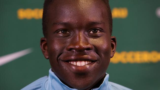 SYDNEY, AUSTRALIA - SEPTEMBER 14: Player Garang Kuol speaks with the media during a Socceroos squad announcement and press conference at Dexus Place on September 14, 2022 in Sydney, Australia. (Photo by Lisa Maree Williams/Getty Images)