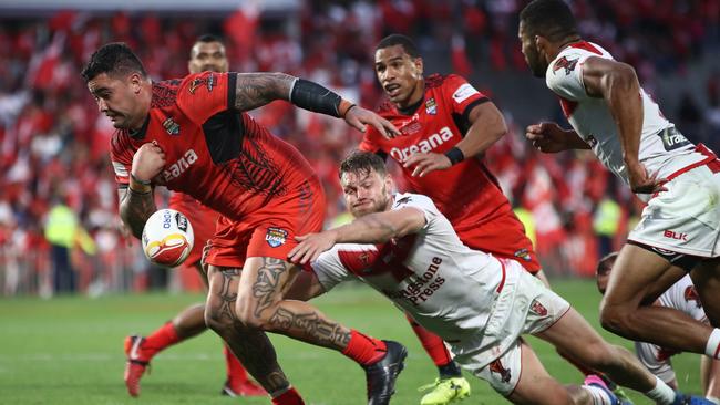 Andrew Fifita loses the ball on the way to the try-line.