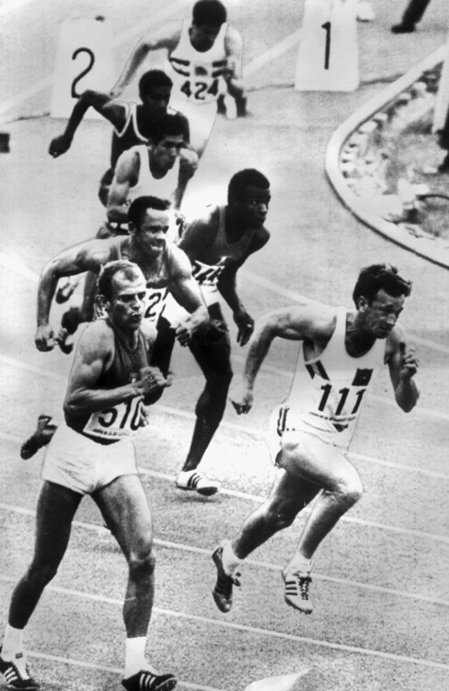 Peter Norman sprints ahead in the 200m semi-final at the 1968 Olympics.