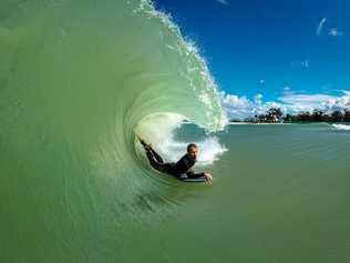 POWER PLUS: Ben Player threads through a bomb on "The Island” break at Surf Lakes' research and development facility near Yeppoon.