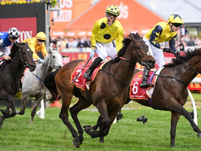 MELBOURNE, AUSTRALIA - OCTOBER 21: Mark Zahra riding Without A Fight defeats Jamie Spencer riding West Wind Blows abd Ben Melham riding Gold Trip in Race 9, the Carlton Draught Caulfield Cup, during Melbourne Racing at Caulfield Racecourse on October 21, 2023 in Melbourne, Australia. (Photo by Vince Caligiuri/Getty Images)