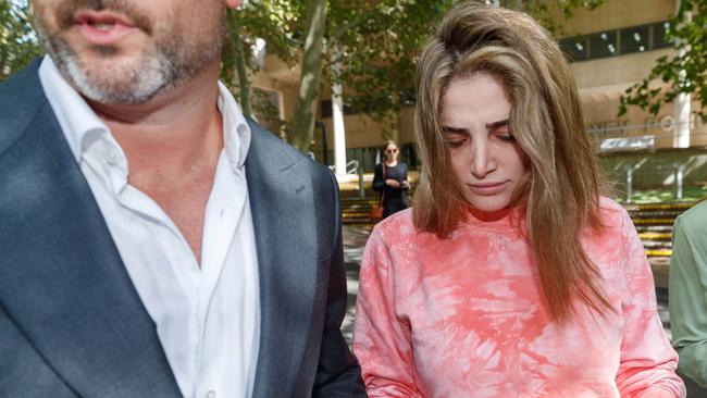 Ashlyn Nassif, 27, leaves Surry Hills Police on bail with her lawyer. Picture: David Swift