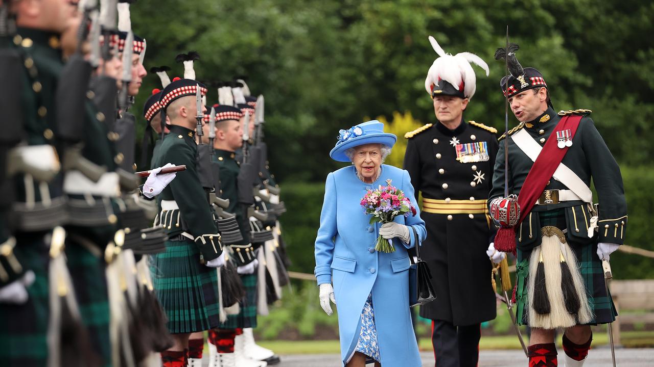 Queen Elizabeth II inspects an Honour Guard at the Palace Of Holyrood House during the Ceremony of The Keys in Edinburgh, Scotland. Picture: Getty