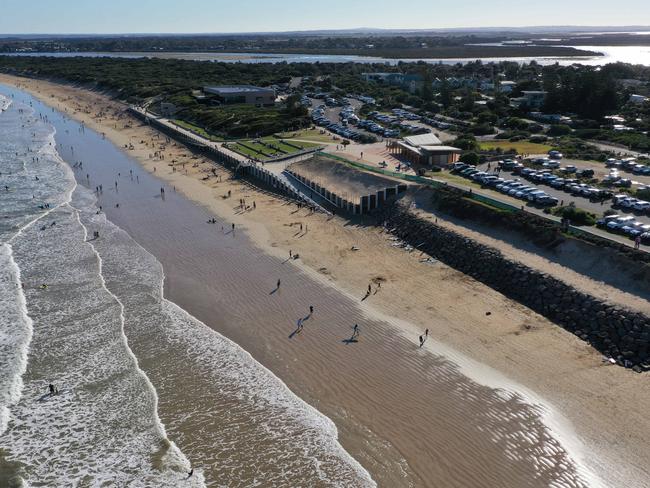 Police and army were on combined patrols of Ocean Grove beach on Saturday. The car parks were summer-like full. Picture: Alan Barber