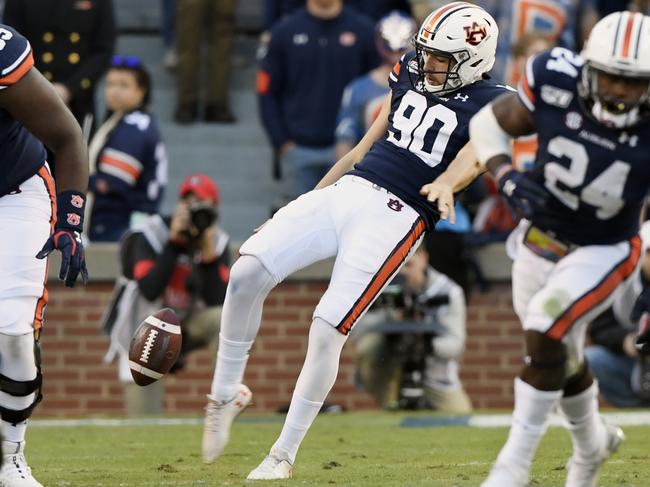 A supplied image obtained on Wednesday, April 1, 2020, of former St Kilda AFL forward Arryn Siposs (90) during Auburn football vs Georgia on Saturday, Nov.16, 2019 in Auburn, Alabama, United States. (AAP Image/Supplied by Todd Van Emst/AU Athletics) NO ARCHIVING, EDITORIAL USE ONLY