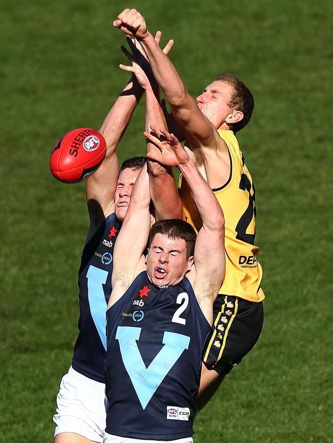 Western Australia’s Aaron Naughton spoils two Vic Metro players. Could he be the key defender Fremantle need? Picture: Getty